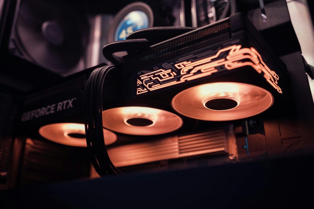 Detailed image of a GeForce RTX GPU with glowing LED lights inside a computer case.